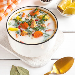 Lohikeitto, Finnish creamy salmon soup in a white bowl