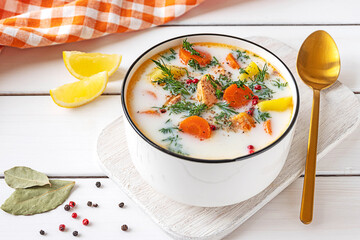 Lohikeitto, Finnish creamy salmon soup in a white bowl