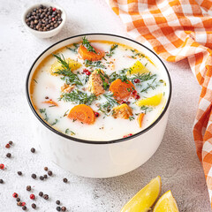Lohikeitto, Finnish creamy salmon soup in a white bowl