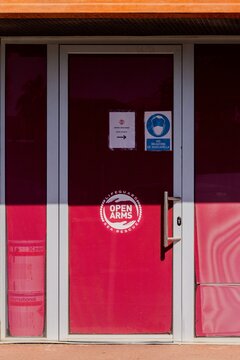 Barcelona, Spain - June 14, 2022. Logo And Facade Of The Office Of Proactiva Open Arms (POA) Is A Spanish NGO Dedicated To Rescue At Sea, Or SAR. Founder, Óscar Camps