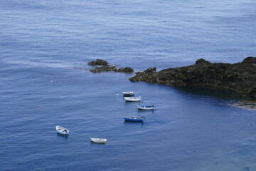 Naklejka premium Small boats off the south coast of Guernsey
