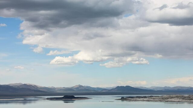 Time Lapse of the clouds moving above the salt water Mono Lake in California.