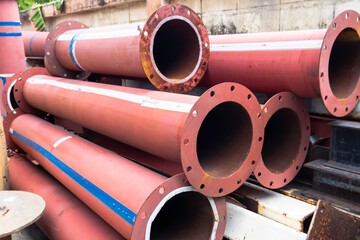 Rust-proof painted steel pipes in the factory. Rust-proof paint, water pipes