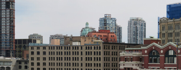 Architectural puzzle of Vancouver downtown roofs and walls