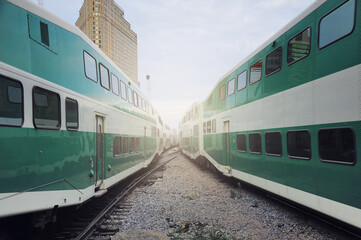 Passenger local trains move at Toronto Union station.
