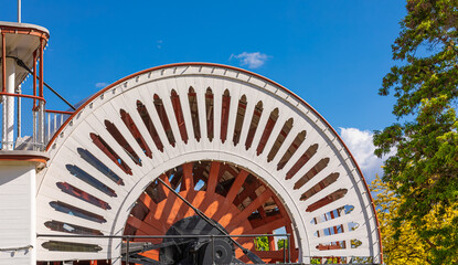 Steamboat Red Paddle Wheel. Closeup Of Red Paddle Wheel On River Boat