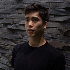 Portrait of a young man outside