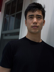 Portrait of a young man outside