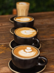 Some coffee cups in a table 