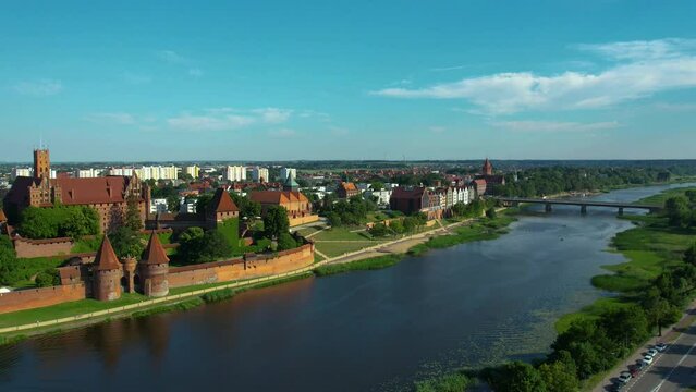 Hyperlapse from a quadrocopter over the river near the castle in Malbork