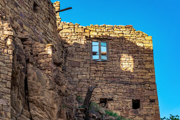 dilapidated house against the sky in the ancient abandoned village of Gamsutl