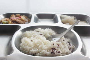 Food in a tray for holding food.