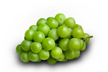 Bunch of green grapes lay on a white background with clipping paths.