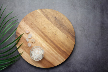 top view of pink rock salt on a chopping board on table 