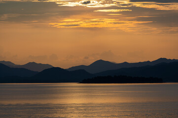 Fototapeta na wymiar view of sunset over lake in Thailand