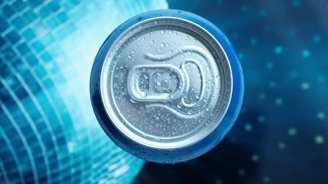 
a man's hand takes a cold beer or a can of soda with drops of water. Drink drinks in aluminum cans with a latch. View from above. blue iridescent screen background
