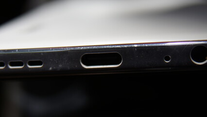 Close Up of USB type C, mic jack, and speakers on mobile phone