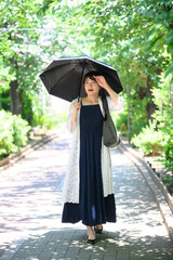 Woman with parasol Vertical © kapinon
