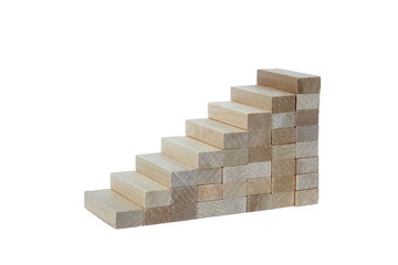 Tower of wooden blocks on a white background in the form of stairs.