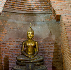 A Buddha statue located in the central Prang of Wat Yai Chai Mongkhon , a Buddhist temple in Ayutthaya Thailand. 
The monastery was constructed by King U-Thong in 1357 AD. 