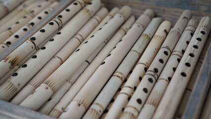 Collection of bamboo flutes in the store