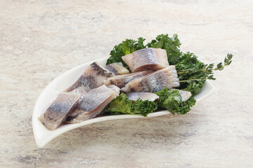 Herring fillet slice on the bowl