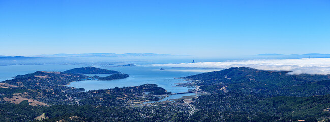 Panoramic view of San Francisco Bay from Mount Tamalpais with scenic dense fog covering Pacific...