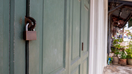 a padlock on the old door