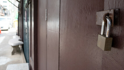 a padlock on the old door
