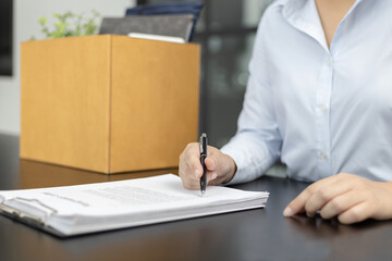 Sign the termination contract, resignation letter sign, End of the employment contract or termination of employment, Move to a new job, Take the pressure of the work that can't be done