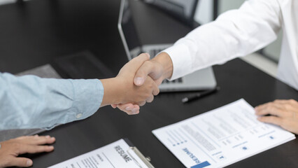 Employer or HR department welcomes new employees, Shaking hands with congratulations or achieving business and income success, selection of new staff representatives, Qualified, Hand shake concept.