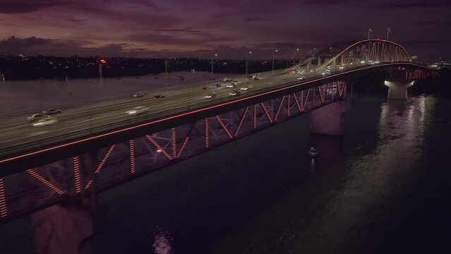 Auckland harbour bridge lit up at night, New Zealand