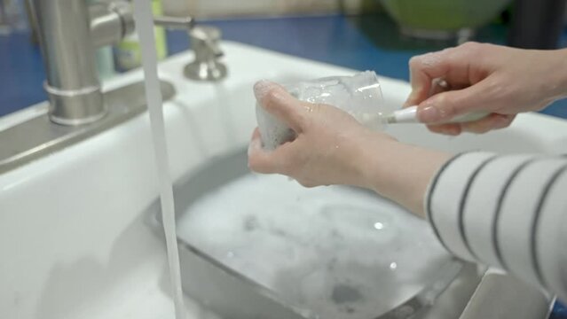 Cleaning and setting up breast pump.