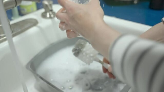 Cleaning and setting up breast pump.