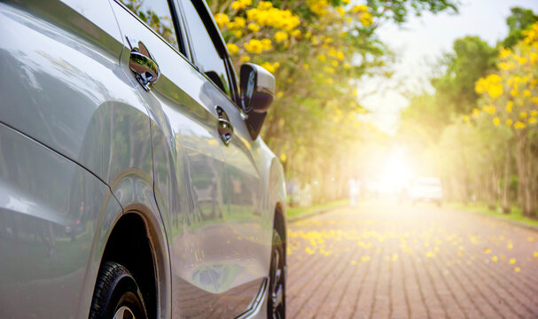 Car on asphalt road on summer day at road with copy space. Car insurance concept. Vacation and travel concept. road trip, driving on highway road. Transportation and travel. 