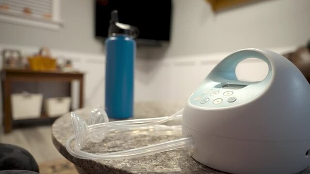 Cleaning and setting up breast pump.
