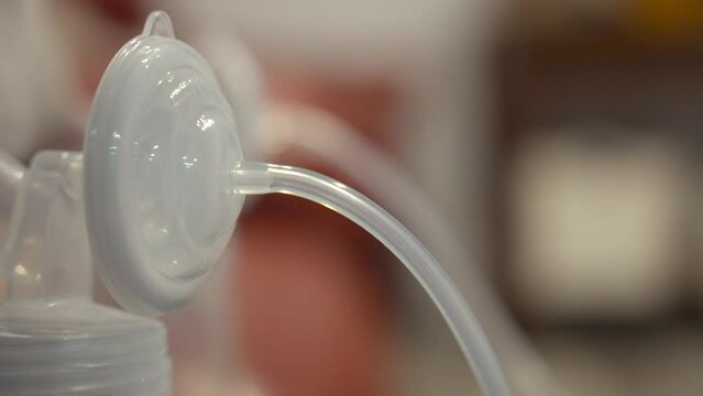 breast pump up close while pumping 