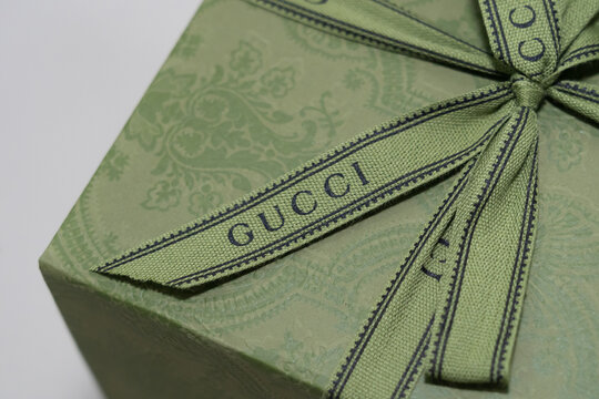 Close up of GUCCI Logo ribbon on gift box