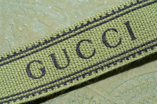 Close up of GUCCI Logo ribbon on gift box