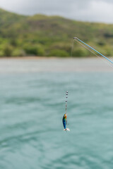 Hawaii Fishing Pier on a cloudy day overlooking the ocean.