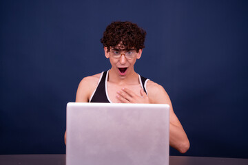 A man watches an adult video online.