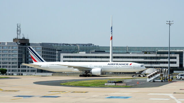Paris, France. Air France Boeing 777 airplane at the gate. View at Charles de Gaulle International Airport. AirFrance Airlines