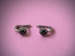 Silver earrings with cubic zirconia close-up