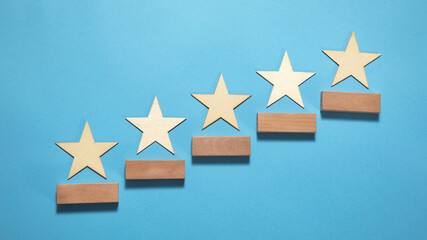 Wooden 5 stars with a wooden blocks. Increase rating