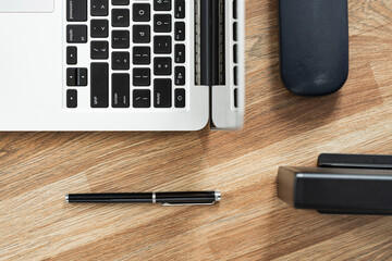 Computer connecting cable on wooden table