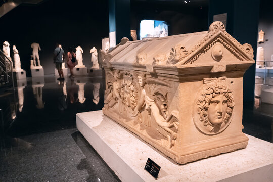 28 May 2022, Antalya, Turkey: Sarcophagus with carved bas-relief in the Archaeological Museum of Antalya. Ancient Lycian burial ceremony and tombs