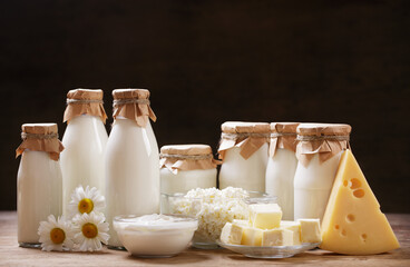 Dairy products. Bottles of milk, cheese, cottage cheese, yogurt, butter