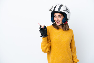 Young caucasian woman with a motorcycle helmet isolated on white background intending to realizes the solution while lifting a finger up