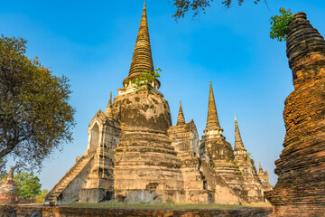 Fototapeta premium Ancient temple in Ayutthaya, Thailand. The temple is on the site of the old Royal Palace of ancient capital of Ayutthaya