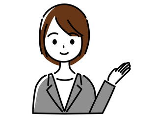左手でこちらですと紹介するスーツ姿の女性（上半身）